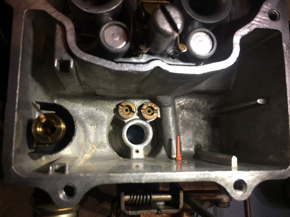 Carburetor interior with two brass jets visible