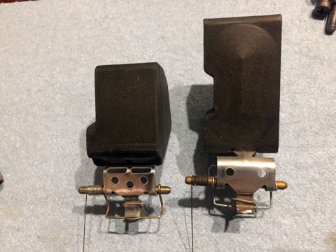 1978 Ford Bronco - Two carburetor components are shown, one slightly larger than the other, on a textured gray background.