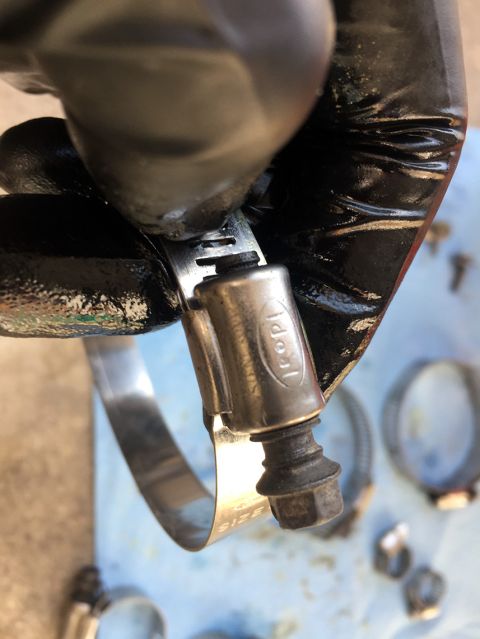 1978 Ford Bronco - An Ideal hose clamp is shown being adjusted, likely for a fuel tank line.