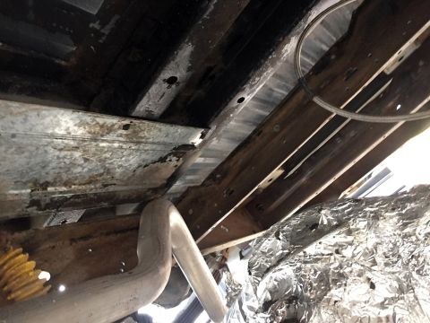 1978 Ford Bronco - Undercarriage components including frame rails and exhaust system are visible in this photo.