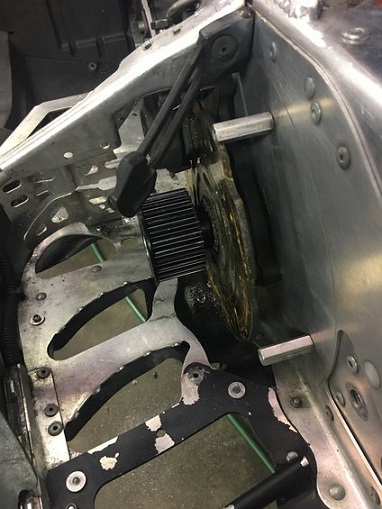 2000 Ford E350 - Detail view of a snowmobile's drive sprocket and linkage mechanism.