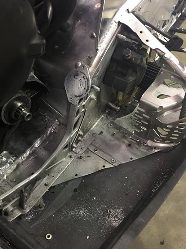 2000 Ford E350 - This is a close-up view of a snowmobile's internal chassis and mechanical parts.