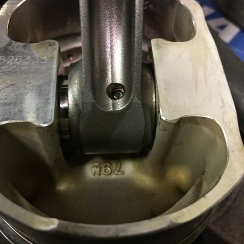 2000 Ford E350 - Engine part: piston and connecting rod assembly with visible part numbers.