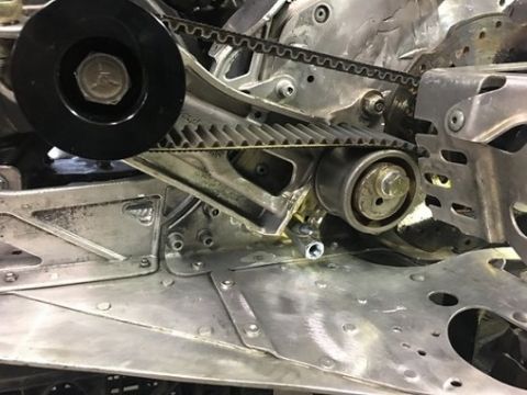 2000 Ford E350 - Engine timing belt and pulleys are visible in this close-up mechanical shot.