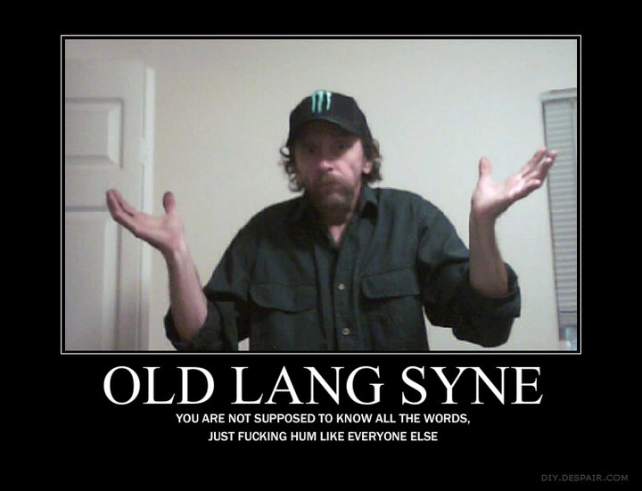 Man with hands up wearing a baseball cap