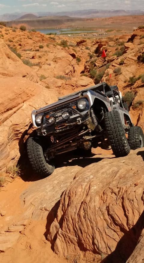 1979 Ford Bronco - This 1979 Ford Bronco navigates a challenging off-road course in a desert landscape.