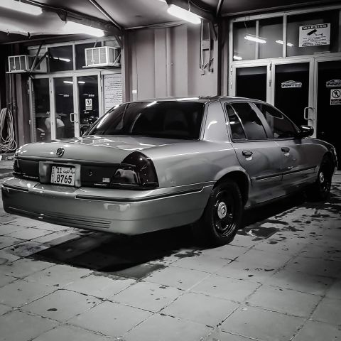 2001 Mercury Grand Marquis - This 2001 Mercury Grand Marquis is shown from the rear in a garage setting.