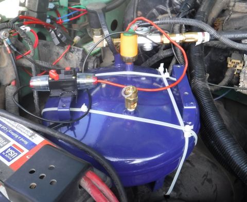 1992 Ford Bronco - Tank secured in crude but effective fashion, inline circuit breaker lined up (awaiting a proper mount; will shorten the wires at that point…