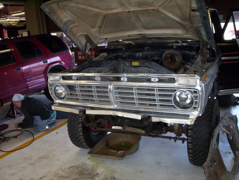 1978 Ford Bronco front grille and engine bay with hood open