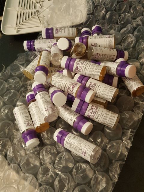 2007 Dodge Durango - Bottles of flavoring are piled on bubble wrap, with a white rack in the background.