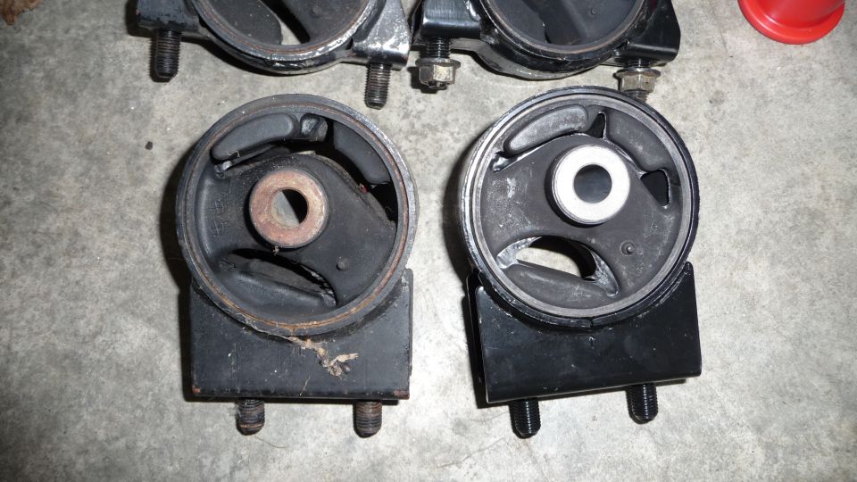 Engine mounts, one worn and one new