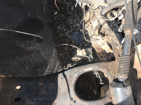 1992 Ford Bronco - Close-up view of engine bay and suspension components, showing rust and wear.