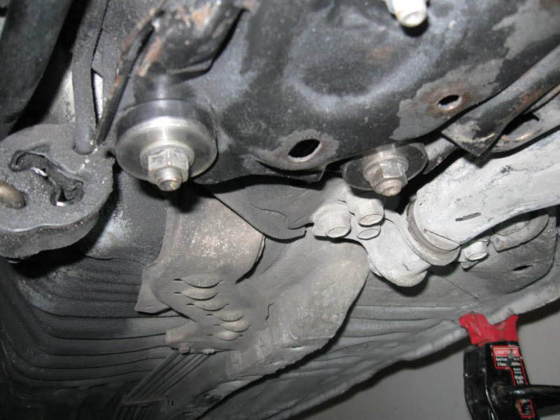 Close-up of suspension mounts and bolts