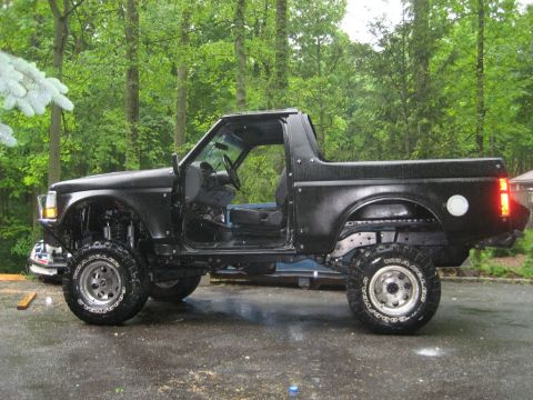 1992 Ford Bronco - This 1992 Ford Bronco is shown with its doors removed and lifted suspension.
