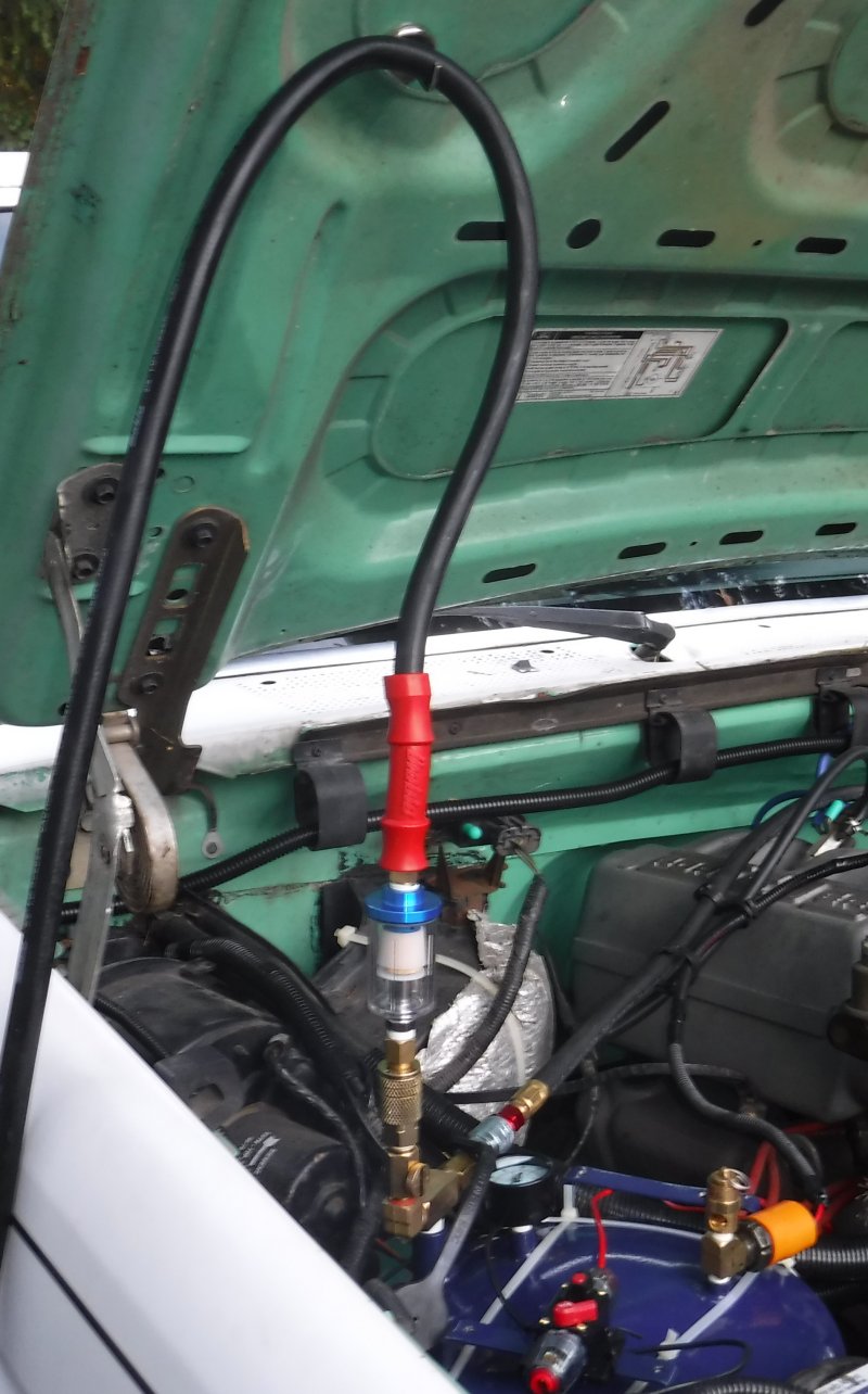 K.I.S.S. hose and fittings strain relief, using a magnet hook.