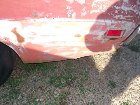 1970 Ford Torino - This vehicle's rear quarter panel shows primer and rust, indicating it is not a 1971 Ford Torino.