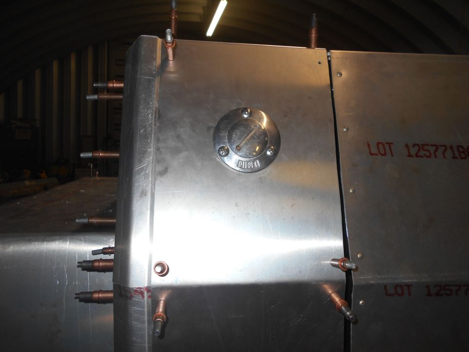 Metal tank with copper fittings and "LOT 125771BG" text