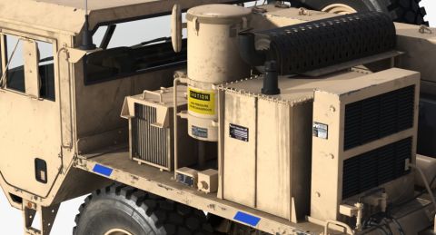 1992 Ford Bronco - A close-up, high-angle view of the rear section of a tan, military-style truck, focusing on auxiliary equipment mounted on the bed. Visible…