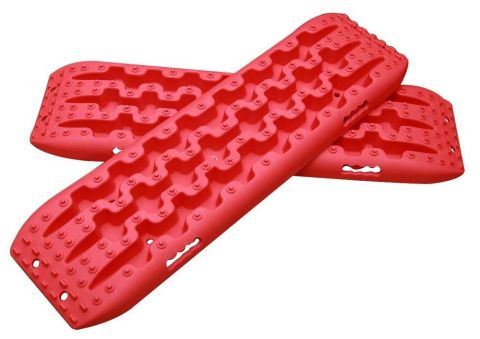 1996 Ford Bronco - Two red traction boards are shown against a white background. The boards have a textured surface with raised circular nubs and a zig-zag pa…