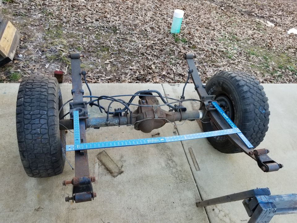 These squares work perfectly as a big caliper to get accurate measurements across the diff housing.  The spring centers are 44 3/8 inches (spec. is 44.59).