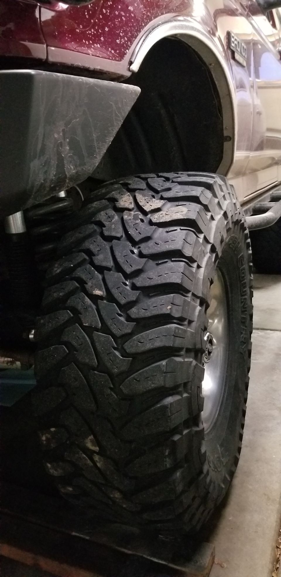 Close-up of a black tire and part of a black fender