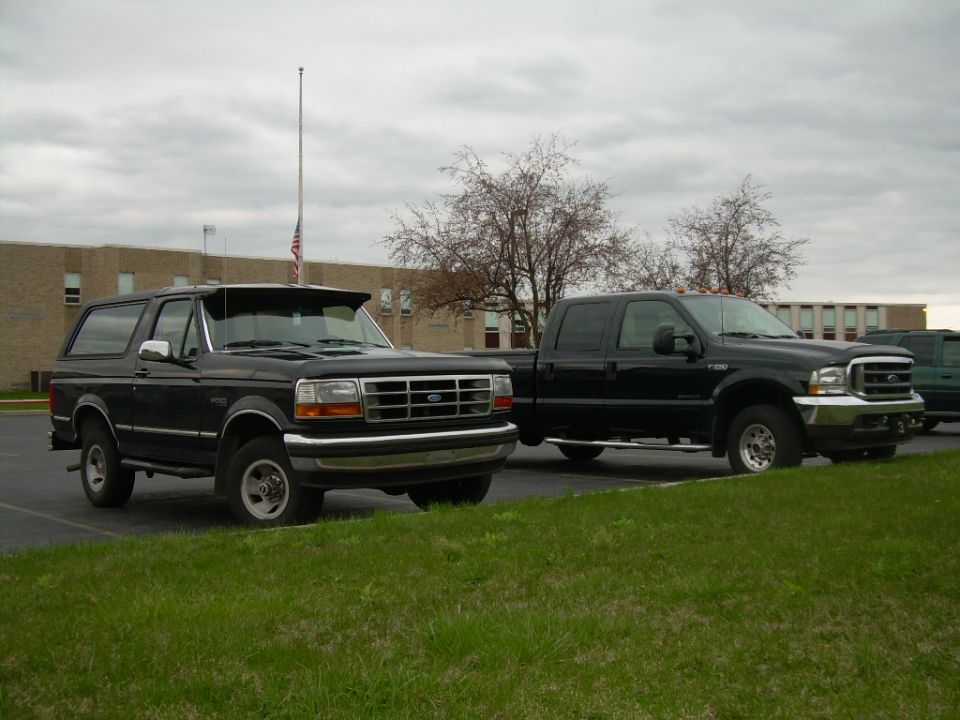 1997 Ford Bronco and a Ford F-250 Super Duty parked