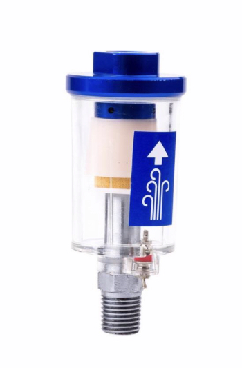 1995 Ford Bronco - A close-up view of an inline air filter with a blue cap and a clear housing. A blue sticker with a white arrow and air flow graphics is vis…