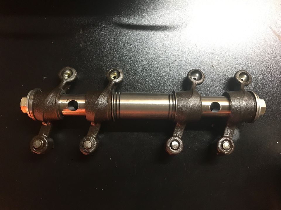 Rocker arm assembly with six rocker arms on a shaft