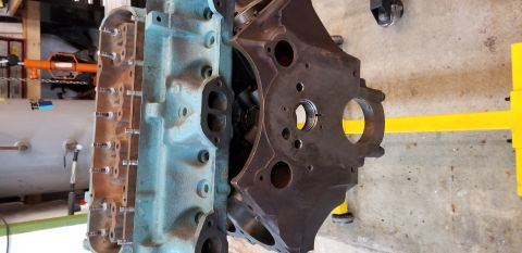 1970 Pontiac GTO — Disassembled Pontiac V8 engine block and cylinder head on an engine stand.