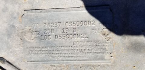 1970 Pontiac GTO VIN plate with stamped numbers and text.
