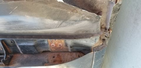1970 Pontiac GTO — Underside of vehicle showing rust and corrosion on metal parts.