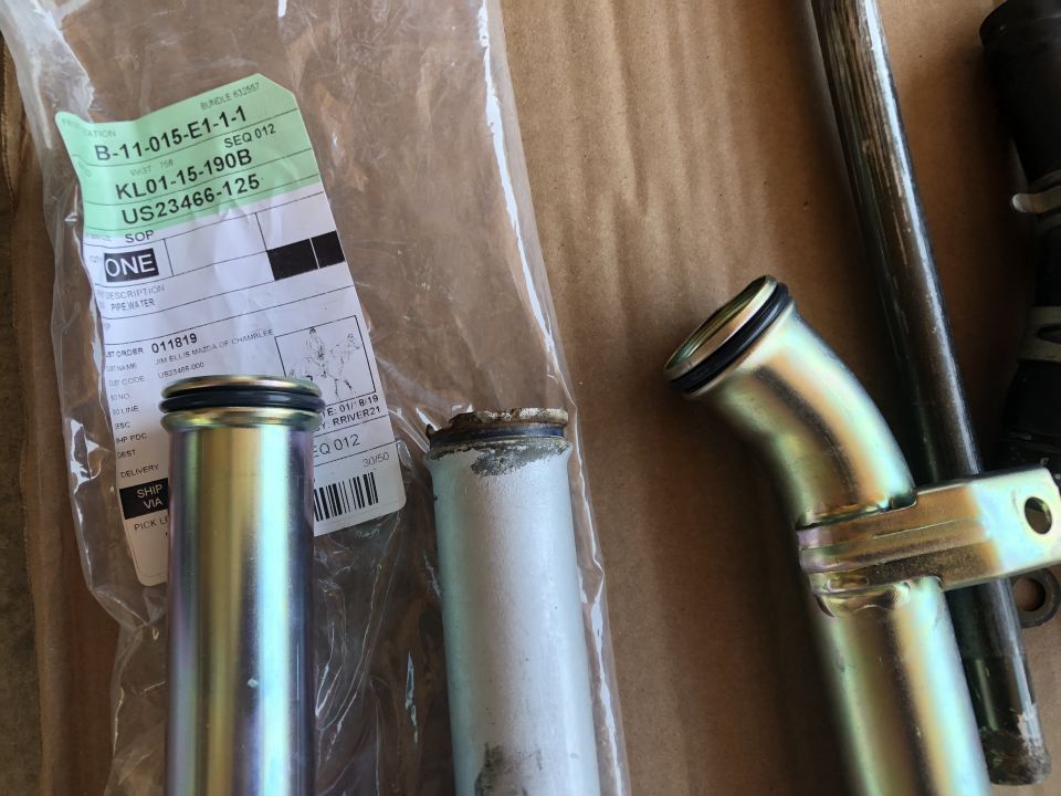 Pipe water part with label KL01-15-190B
