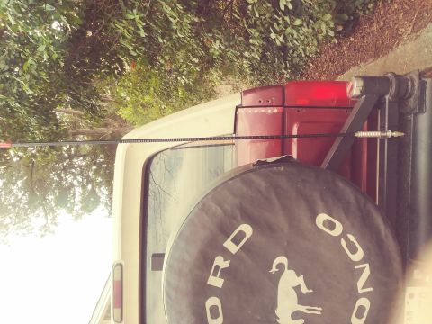 1996 Ford Bronco - The spare tire cover on this Ford Bronco indicates it is from the 1992-1996 generation.