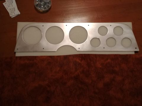 1977 Ford Ranchero - Custom aluminum gauge panel with various sized openings for instruments.