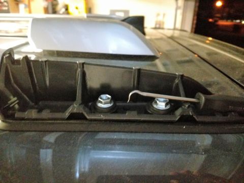 2018 Toyota 4Runner - Close-up view of the mounting hardware for a vehicle's roof rack system.