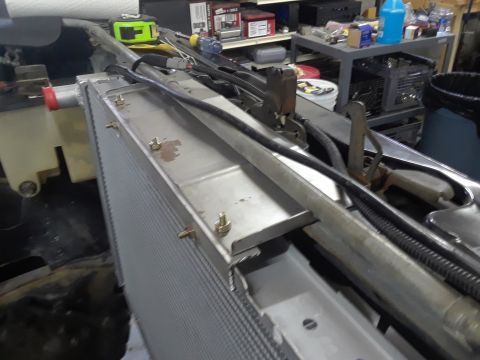 1985 Ford Bronco - Radiator and engine bay components are visible in this close-up view.