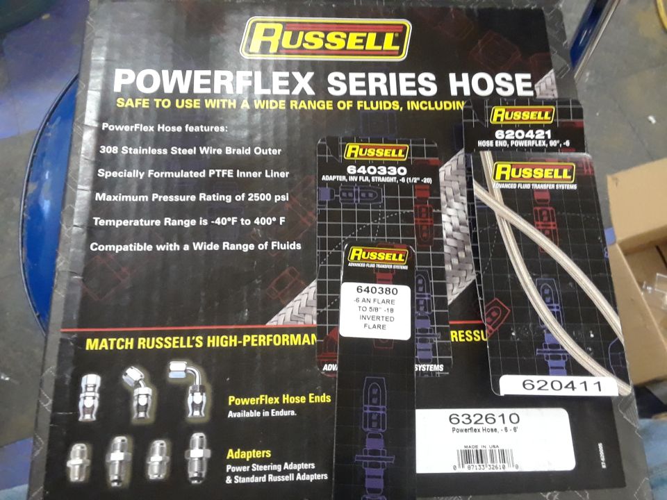 Russell Powerflex Series Hose packaging with various hose ends and adapters shown