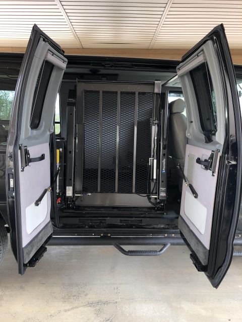 2010 Ford E250 - Interior view of a van equipped with a wheelchair lift system.