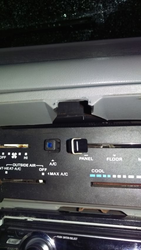 1988 Ford Bronco - Close-up of the climate control panel in a vehicle's interior, showing various settings and labels.