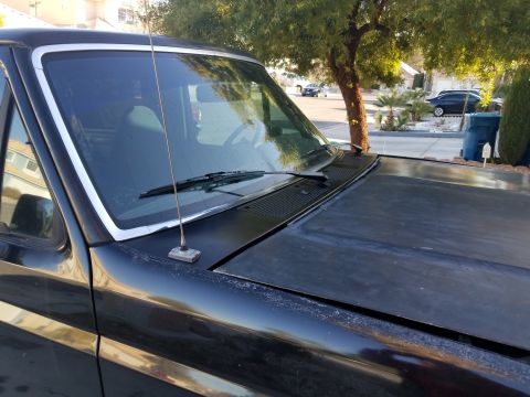 1993 Ford Bronco - This 1993 Ford Bronco is captured from a 3q front angle, its black exterior.
