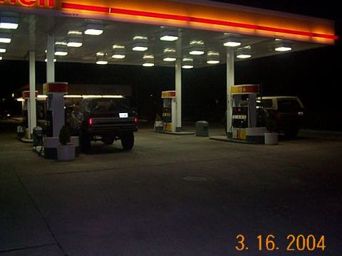1986 Ford Bronco - A 1986 Ford Bronco is seen at a gas station during nighttime hours.