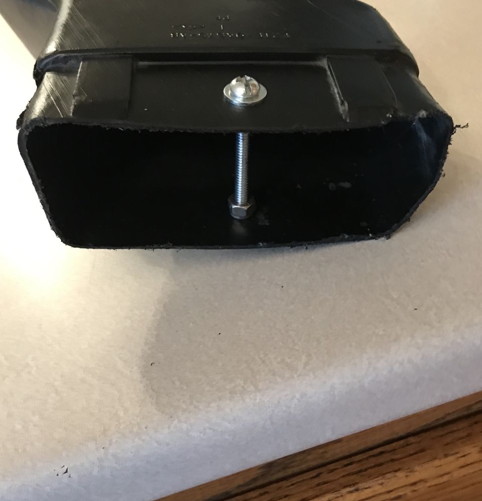 Black air intake duct with bolt and nut