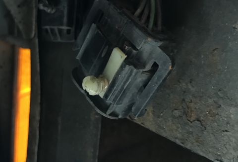 1995 Ford Bronco - This image shows a close-up of a vehicle's electrical connector, not a 1995 Ford Bronco.