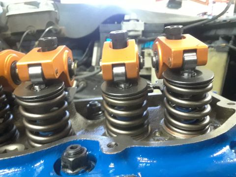1985 Ford Bronco - Engine valve train components, including roller rocker arms and valve springs, are visible in this close-up shot.