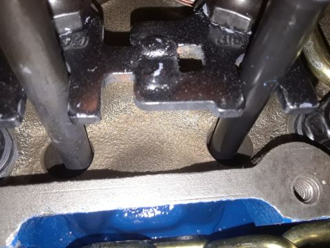 1985 Ford Bronco - Engine valve train components, including rocker arms and pushrods, are visible in this close-up view.