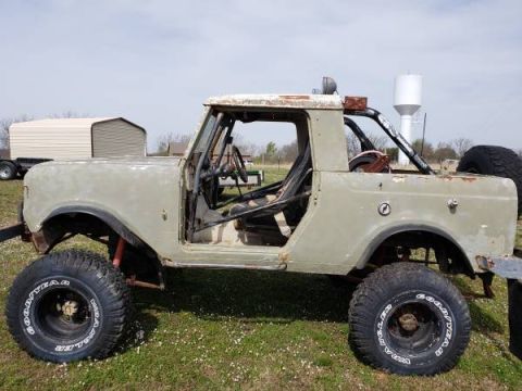 1991 Ford Bronco - This heavily modified International Harvester Scout II features a roll cage and off-road tires.