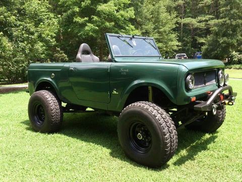 1991 Ford Bronco - This lifted 1971 International Harvester Scout II features large off-road tires and a custom front bumper.