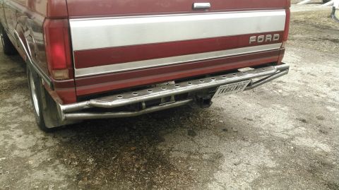 1991 Ford F-150 - Rear view of a 1991 Ford F-150 pickup truck a custom metal bumper and a Texas license plate.
