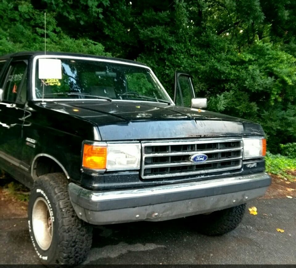 Black 1988 Ford Bronco front grille and headlights
