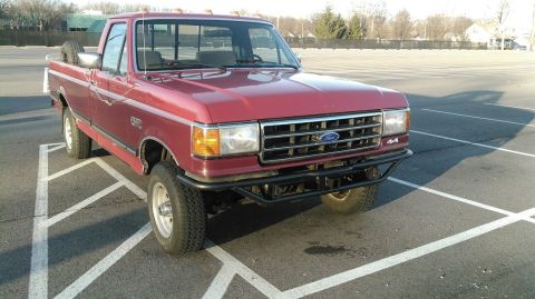 1991 Ford F-150 - This 1991 Ford F-150 pickup truck is shown from the front three-quarter view.